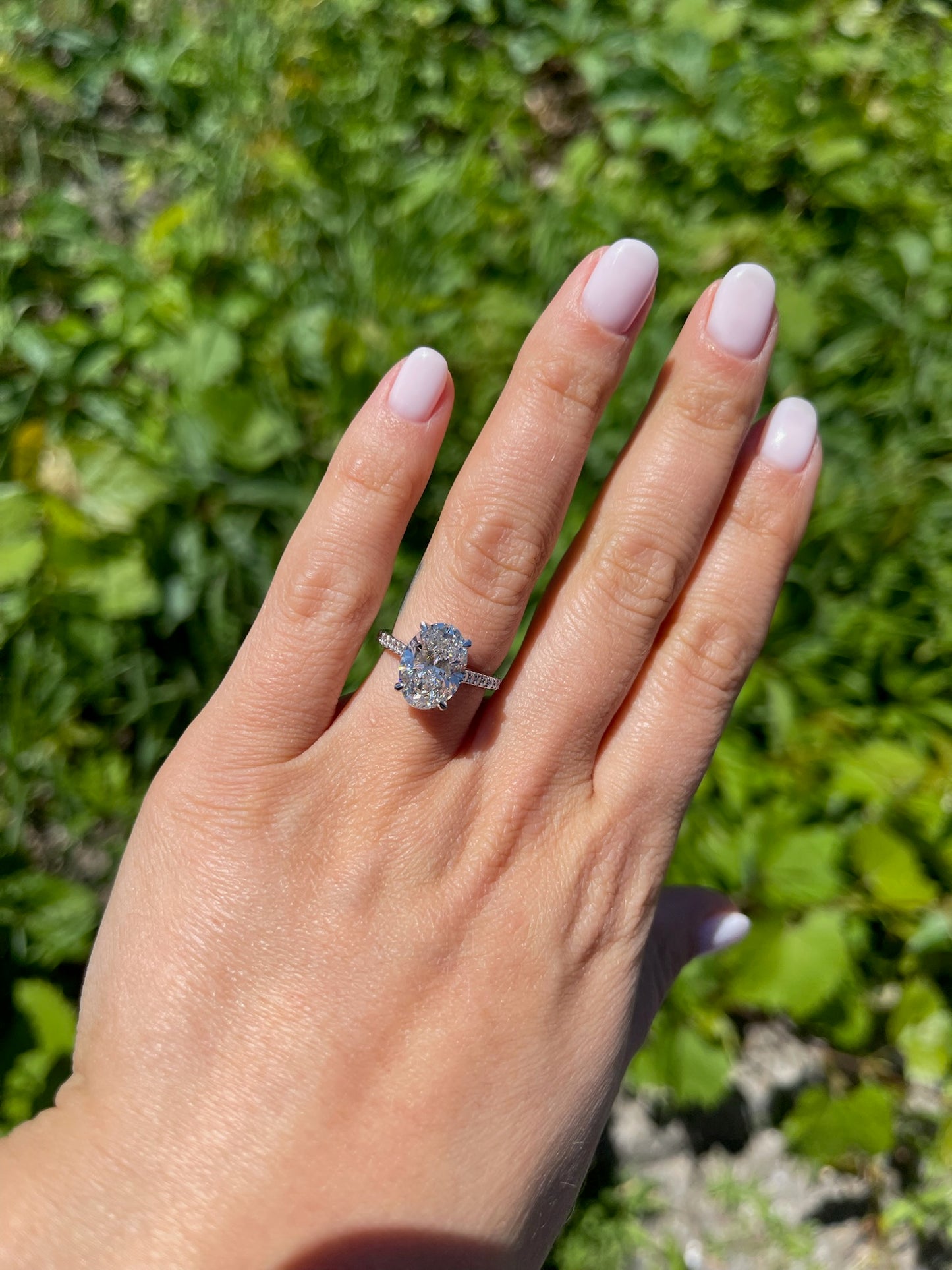 Oval Solitaire Hidden Halo Engagement Ring
