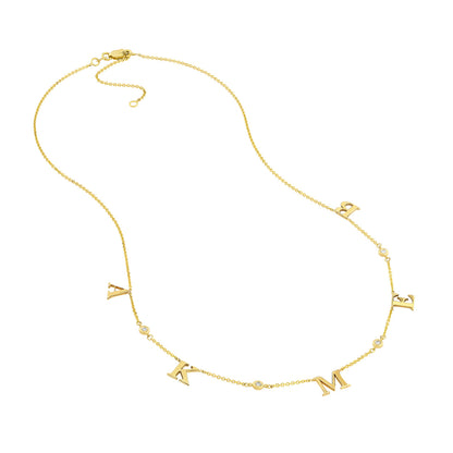 Collier station avec initiale et lunette en diamant