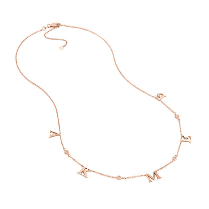 Collier station avec initiale et lunette en diamant