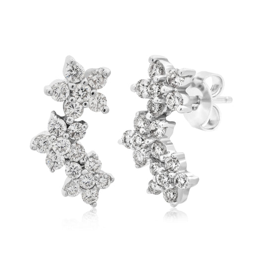 Puces d'oreilles trio de diamants floraux